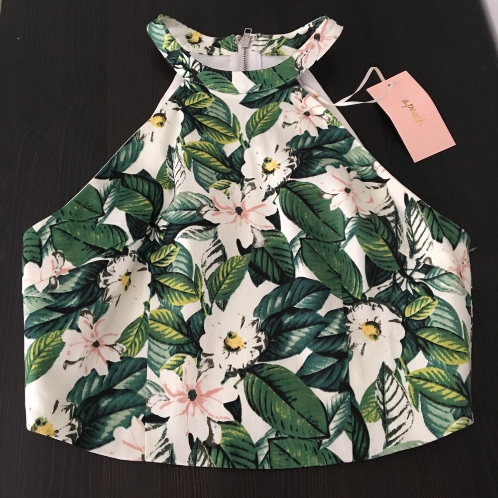 Crop top with zipper back. New with tags!